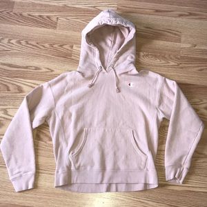 Champion cropped light pink hoodie.